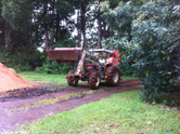 moving Camphor with the tractor 